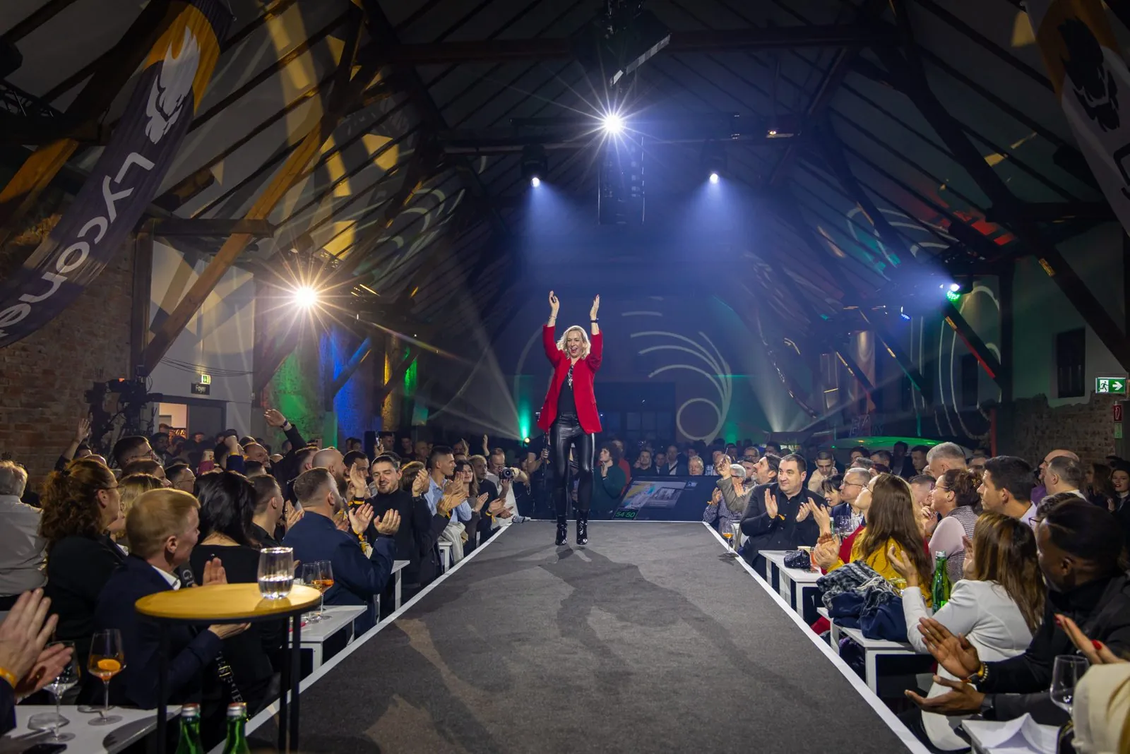 Denise Stadtegger on the runway in front of an audience