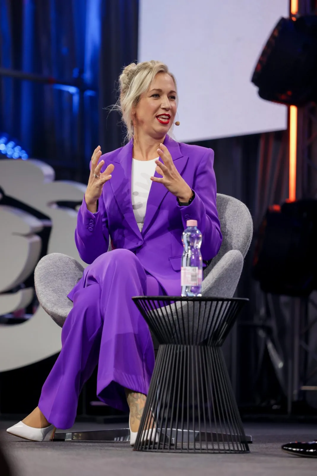 Denise Stadtegger on a panel on stage